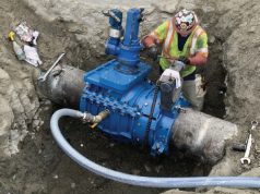 Fire suppression service remains live during valve insertion